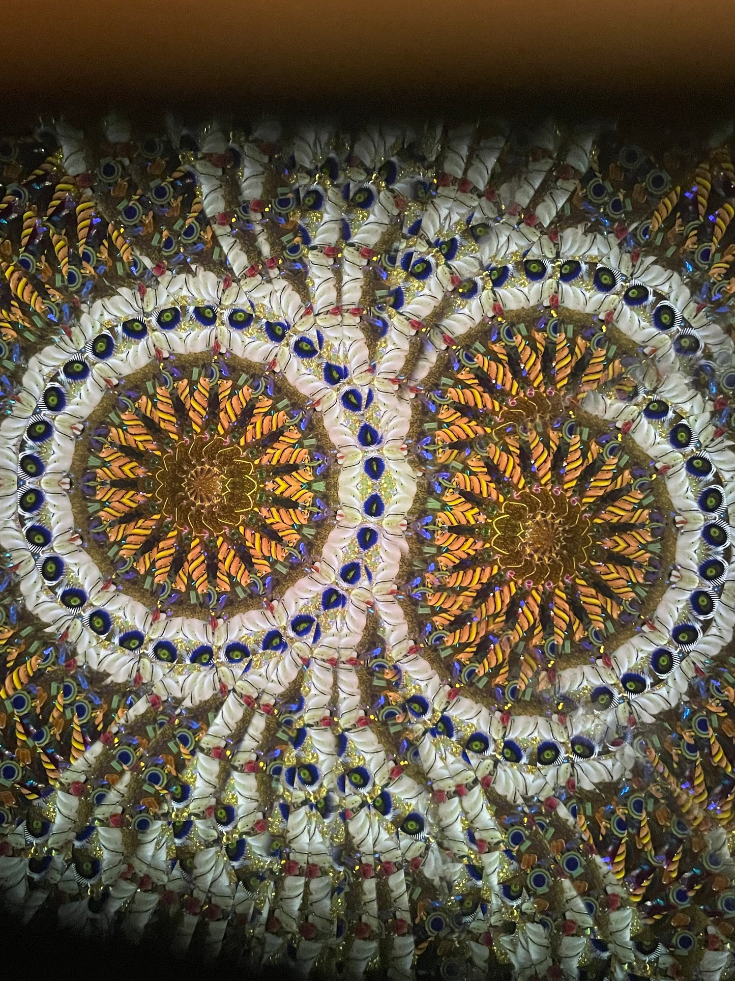 Wooden Kaleidoscope, Handheld in  Pomelle 2025 By Artists Carol and Mark Reynolds.